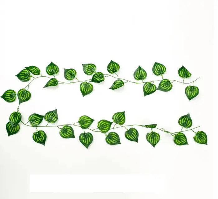 Artificial ivy vine leaves hanging on aesthetic bedroom wall decor setup